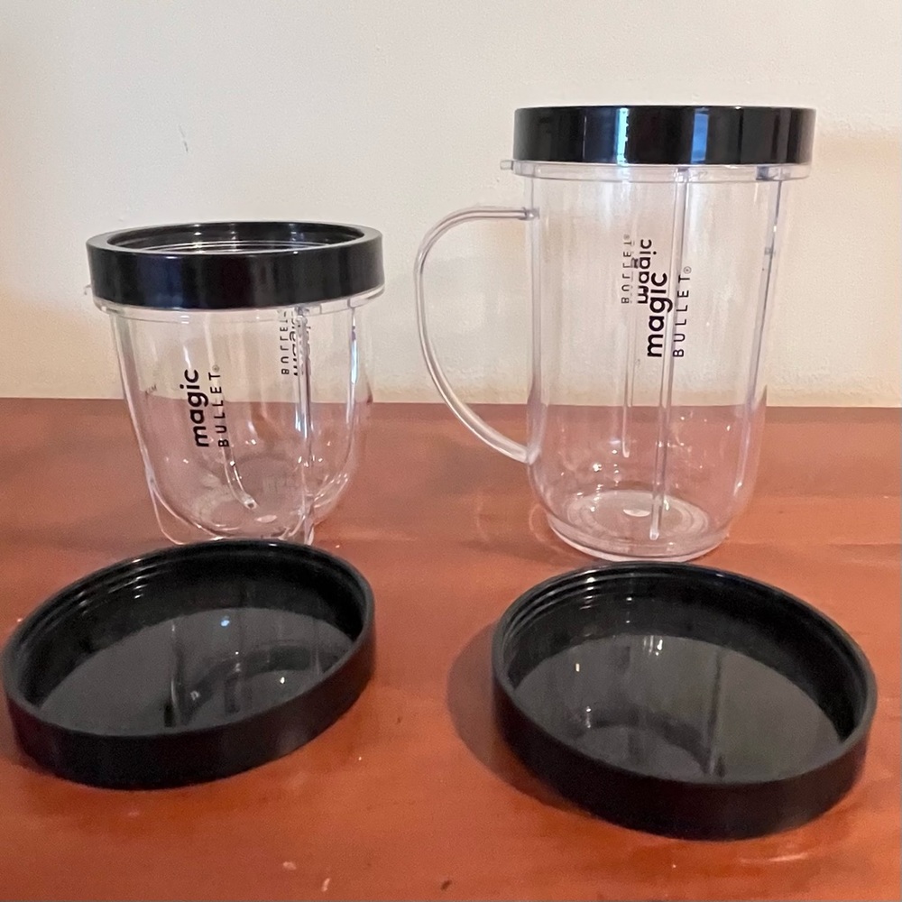 NWOT- Magic Bullet Replacement Cups with Lids.